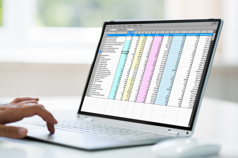 Computer Spreadsheet. Analyst Employee Working With Reports